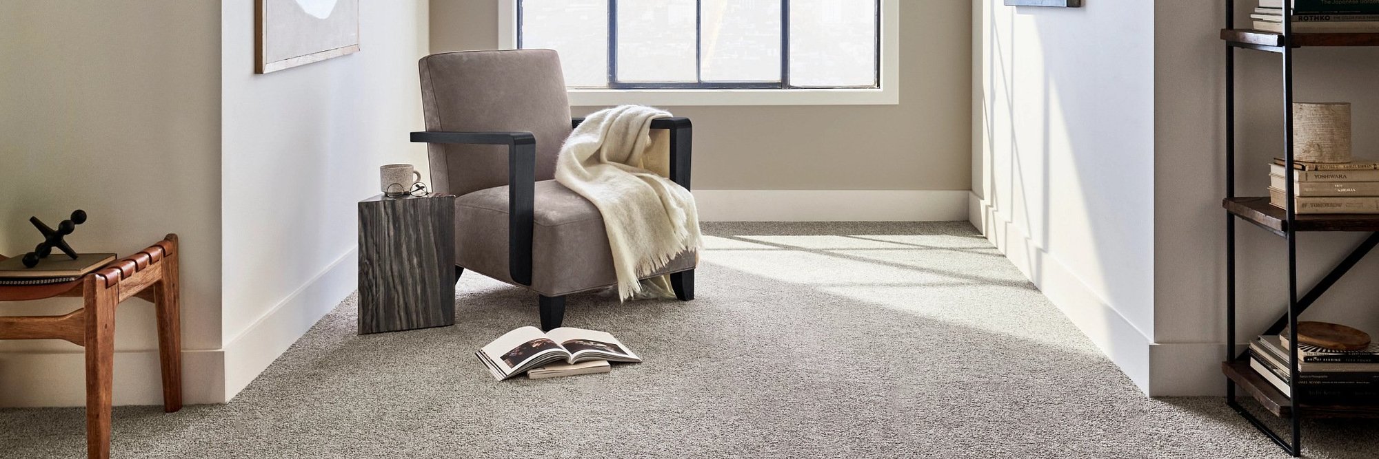 gray armchair on brown carpet from Anderson Flooring Centre, Inc. in Winnipeg, MB