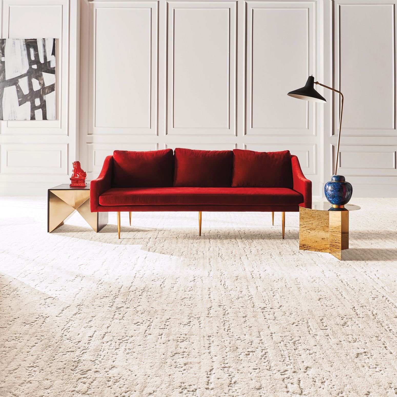 red sofa on beige carpet from Anderson Flooring Centre, Inc. in Winnipeg, MB